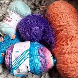 Multiple different yarns